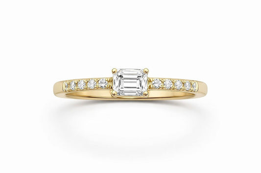 18KT Yellow Gold Diamond Engagement Ring With All Natural Stones. Center Stone Is A 0.59CT Emerald Cut , Diamonds On The