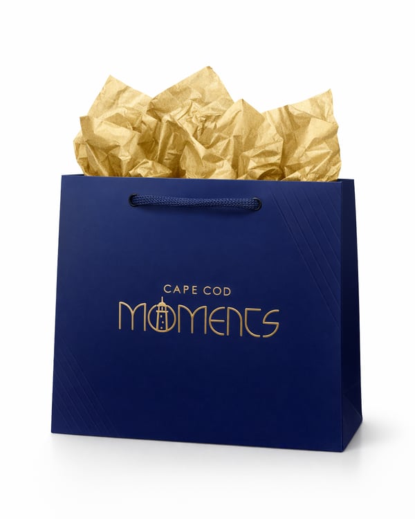 Cape Cod Moments navy gift bag with gold tissue paper