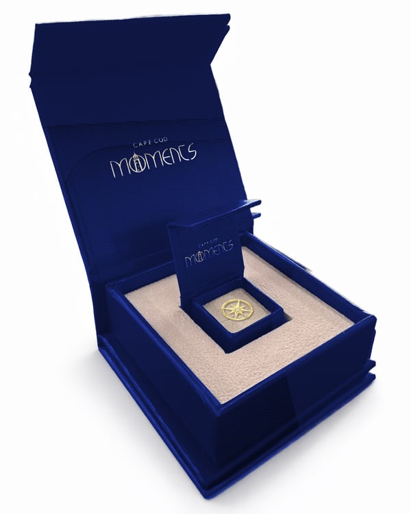 The Cape Cod Moments gift box with the small charm box open inside